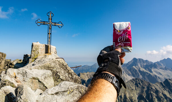 Tatranska Polianka, Slovakia - September 01, 2019: A pack of Elfi tissues presented in your hand on the highest peak (Gerlachov Peak, Gerlachovsky stit, Gerlach) of the Tatra Mountains.