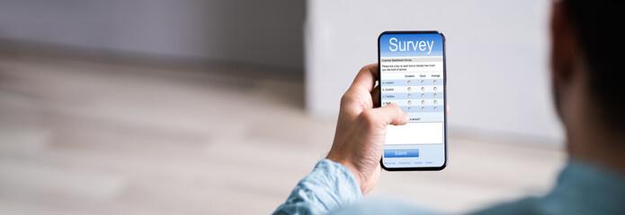 Man Filling Online Survey Form