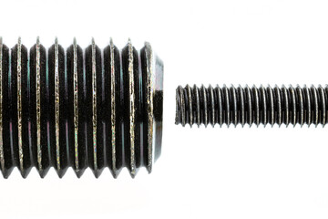 A background made from a macro shot of a grease coated black screw thread, isolated on a white...