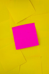 vertical pink sticky note on yellow sticky notes full frame copy space for writing message