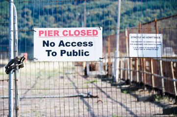 Pier closed no access to public sign