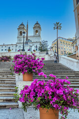 The famous Spanish Steps in Rome with beautiful flowers and no people