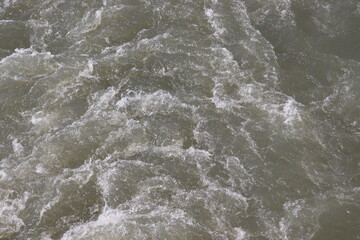 water flowing into the river