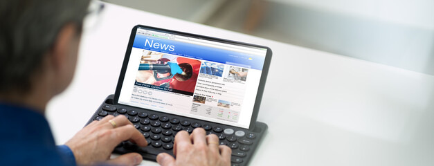 Online Newspaper On Tablet Computer