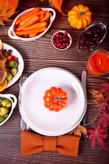 Autumn table setting. Thanksgiving dinner and autumn decoration.