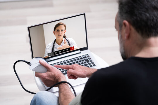 Old Senior Man With Hypertension Video Conferencing