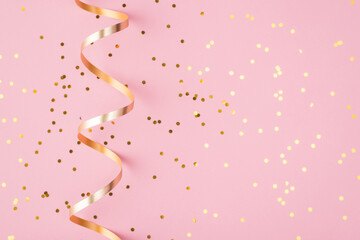 Celebration concept. Top above overhead view close up photo of confetti isolated on patel pink...