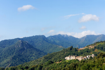 Fototapeta premium Velone-Orneto village and Tavagna mountain in Upper Corsica