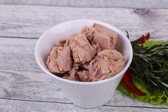 Tasty canned tuna fish in the bowl