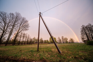 beautiful rainbow above countryside roads