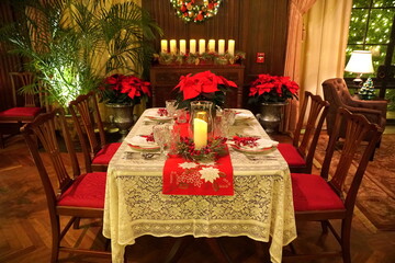 Cozy dinner room and table decorated for Christmas
