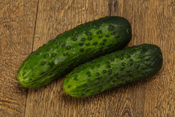Ripe fresh green two cucumbers