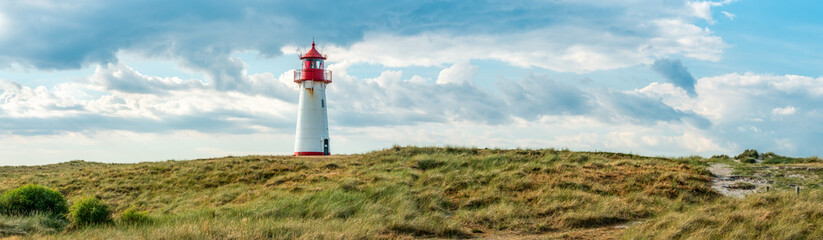 Fototapeta na wymiar Lighthouse List West on the island of Sylt, Schleswig-Holstein, Germany