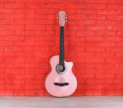 pink guitar and vintage pink travel suitcase © serikbaib