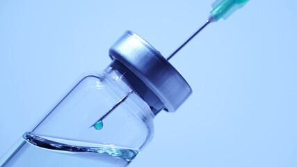 Medical scientist mix vaccine in the vile. Lab developing research of vaccine against Coronavirus,...
