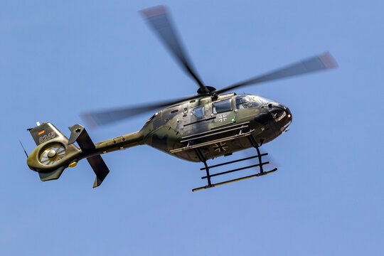 German Army Airbus H135 military utility helicopter in flight.