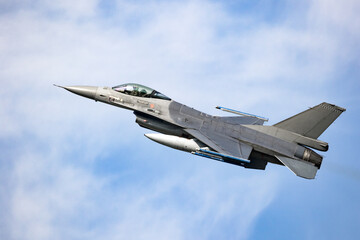 Air force fighter jet in flight.