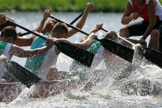 dragon boat paddlers in action