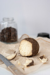 Belper knolle hard swiss cheese small ball with black pepper.