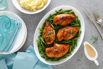 Roasted chicken breast with green beans, boiled mashed potatoes and gravy