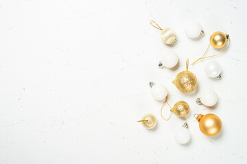 Winter fir tree with snow and decorations at white table.