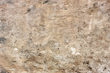 Texture of a concrete wall with cracks and scratches which can be used as a background