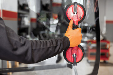 Auto Glass Repair and Replacement, close up. High quality photo
