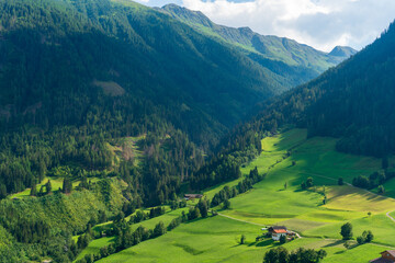 Obraz premium Mountain valley village landscape in Venediger alps . Mountain green valley village view austria near matrei in osttirol