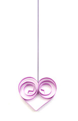 A purple quilling paper heart hanging with string