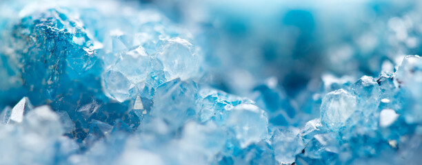 Blue Crystals. Macro. Winter Backgroun.Beautiful Light. Banner format.