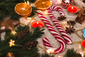 Fototapeta na wymiar beautifully laid out Christmas sweets and Christmas decorations