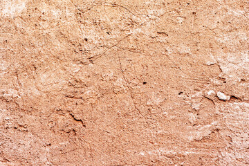 Texture of a concrete wall with cracks and scratches which can be used as a background