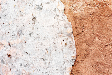 Texture of a concrete wall with cracks and scratches which can be used as a background