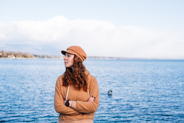 a red-haired girl in a red hat and a red hoodie