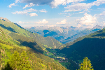 Mountain valley village landscape in Venediger alps . Mountain green valley village view austria near matrei in osttirol