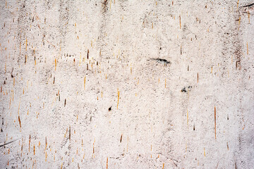 Texture of a concrete wall with cracks and scratches which can be used as a background