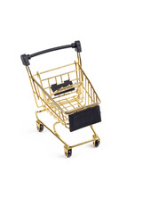 Studio lighting. children's shopping cart made of yellow metal with wheels. Close-up. On a white...