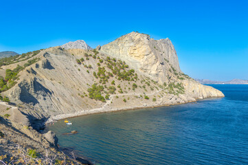 Fototapeta na wymiar Panoramic landscape with Black Sea shore near Noviy Svet resort. Crimean peninsula
