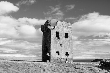 Black and White Photo of abandoned turn of the century Signal tower on the coastal cliffs of Ireland 