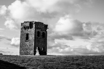 Black and White Photo of abandoned turn of the century Signal tower on the coastal cliffs of Ireland 