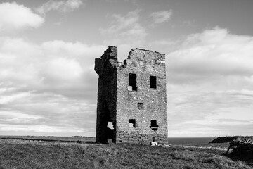 Black and White Photo of abandoned turn of the century Signal tower on the coastal cliffs of Ireland 