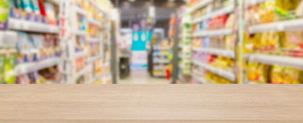 yellow table in front of blurred market background