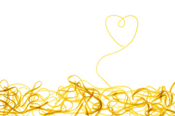 Swirls of cooked spaghetti with fork. Spaghetti heart shape.