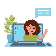 The girl waves from the laptop screen and says something .Communication via the Internet at a distance with children.