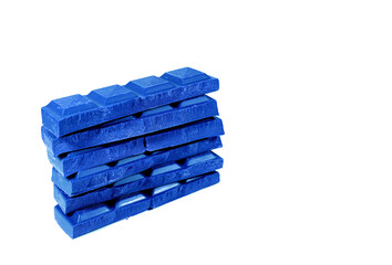 Pop Art Style Cobalt Blue Colored Stack of Chocolate Chunks Isolated on White Background