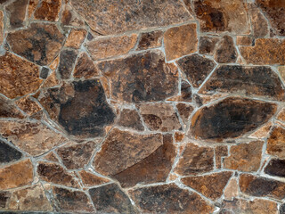 Texture of a stone wall. Old castle stone wall texture background. Part of a stone wall, for background or texture