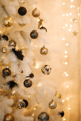 New Year's decor, a room with New Year's locations, a large and beautiful Christmas tree, a lot of lights from a garland, beautiful bokeh, details of the New Year's interior, Christmas decor