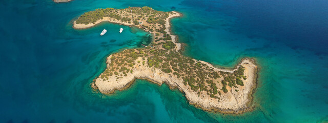Aerial drone ultra wide panoramic photo of tropical exotic mediterranean bay with luxurious yachts and turquoise sea