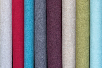 Closeup detail of multi color fabric texture samples.