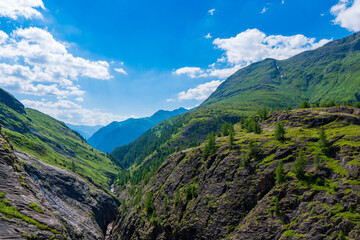 The beautiful view of mountain nature with lake in Glockner alps europe- taken from The Grossglockner High Alpine Road - Grossglockner Hochalpenstrasse
